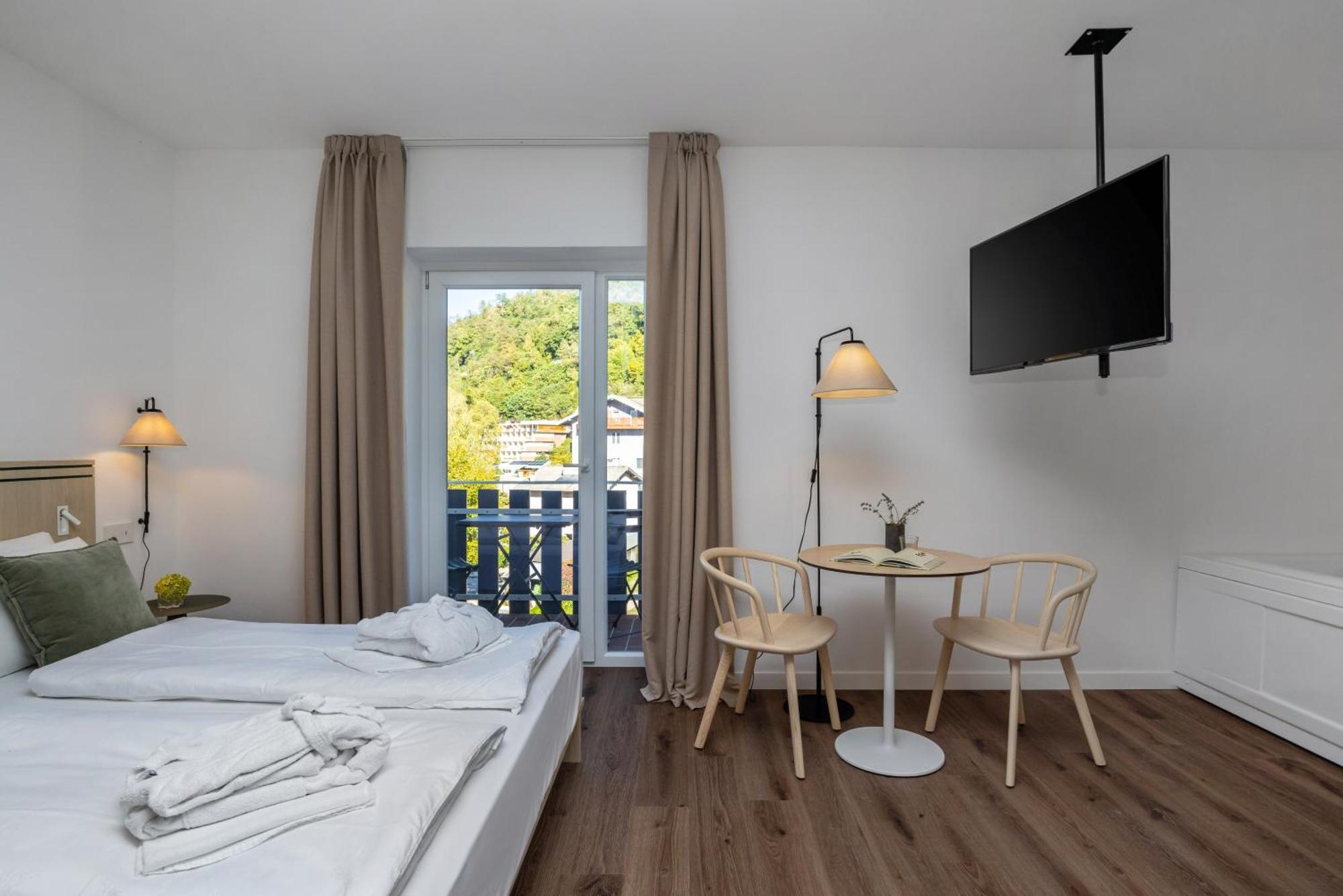 Hotel Al Sorriso Greenpark & Wellness Левико Терме Стая снимка